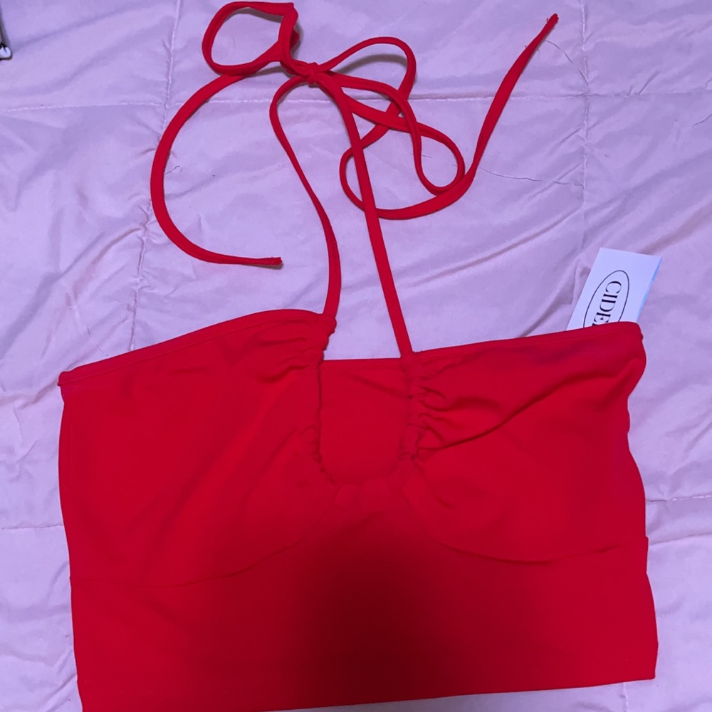 Brand new red cider crop top with tags. Never worn, nothing wrong with it.